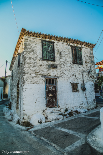 Old House with Black Door and Windows - Vasilitsi