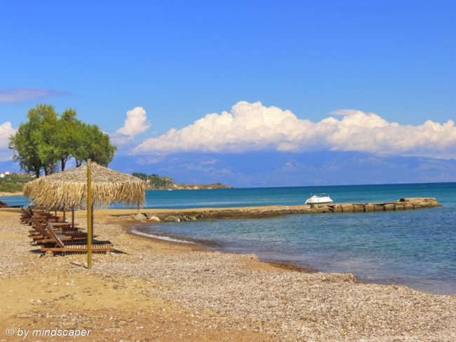Umbrellas at Limanaki - Beach and Mole