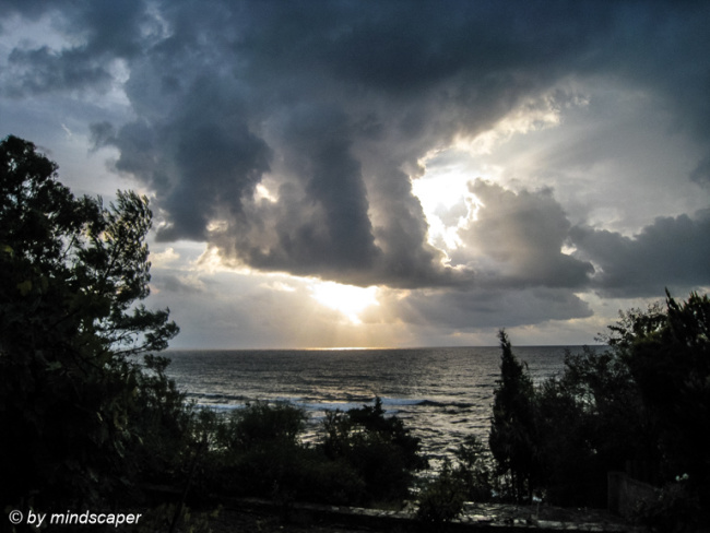 Stormy Morning Sun Above The Sea